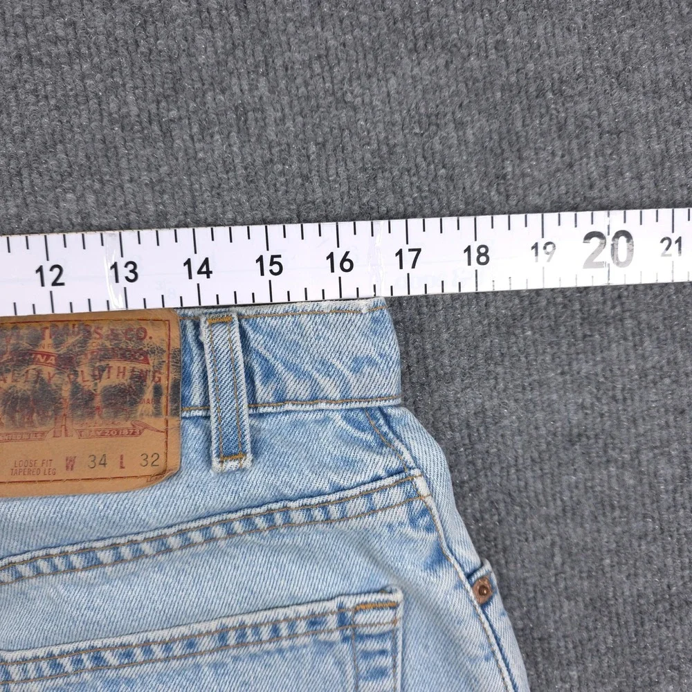 VINTAGE Levis 560 Loose Fit Tapered Leg Jeans Light Wash Blue Mens Denim 34x32